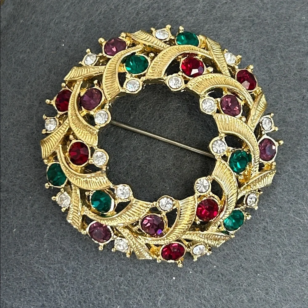 Elegant Gold and Jewel-Toned Brooch